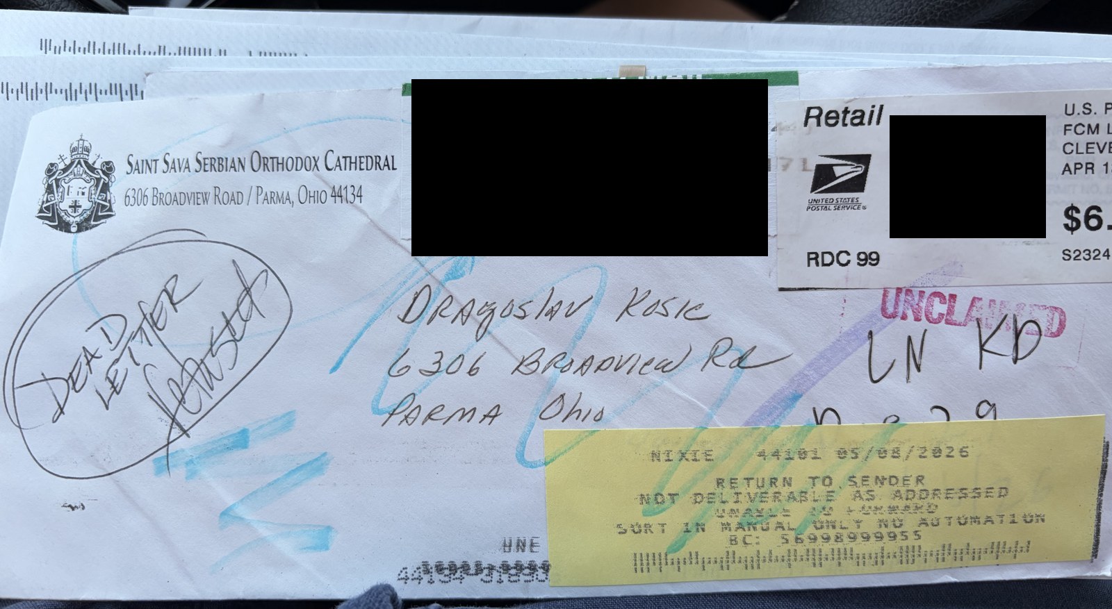 The certified envelope returned to Saint Sava Cathedral, bearing an "Unclaimed" stamp and a "Not Deliverable As Addressed" label